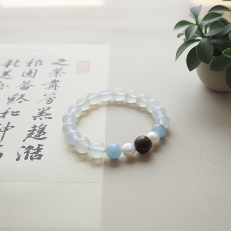 Snowbound Moonrise White Moonstone & Aquamarine Bracelet with Handcrafted Tibetan Incense Bead