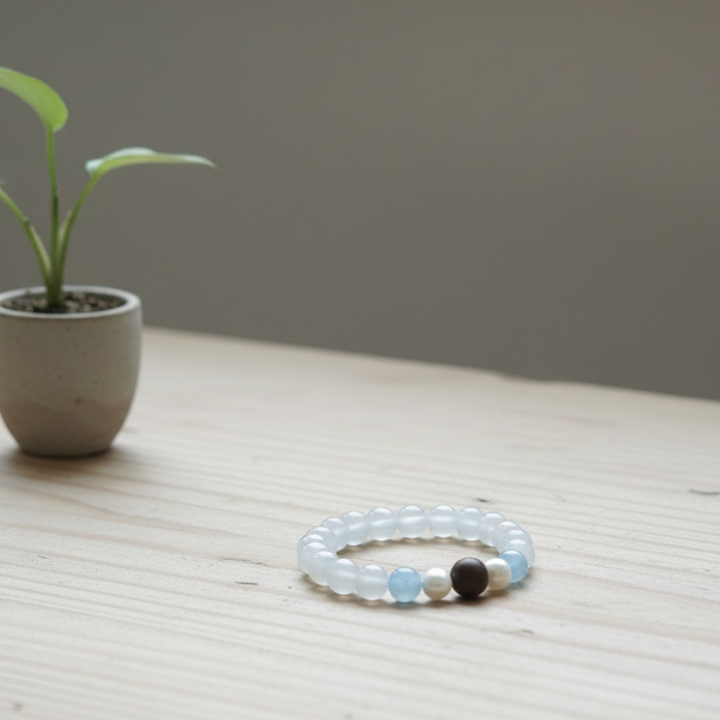 Snowbound Moonrise White Moonstone & Aquamarine Bracelet with Handcrafted Tibetan Incense Bead