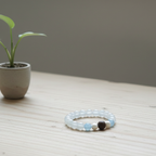 Snowbound Moonrise White Moonstone & Aquamarine Bracelet with Handcrafted Tibetan Incense Bead