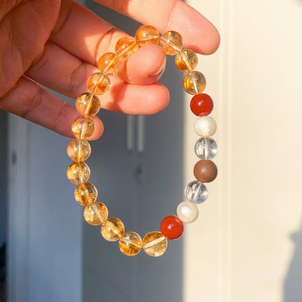 Heartland · Deep Earth Golden Rutilated Quartz & Red Agate Bracelet with Pearl & Handcrafted Tibetan Incense